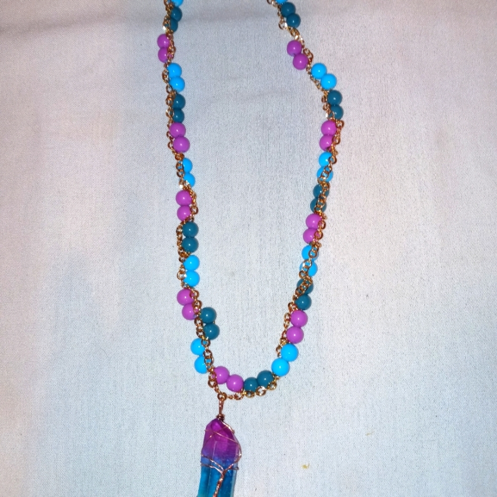 Colorful necklace  with charm.